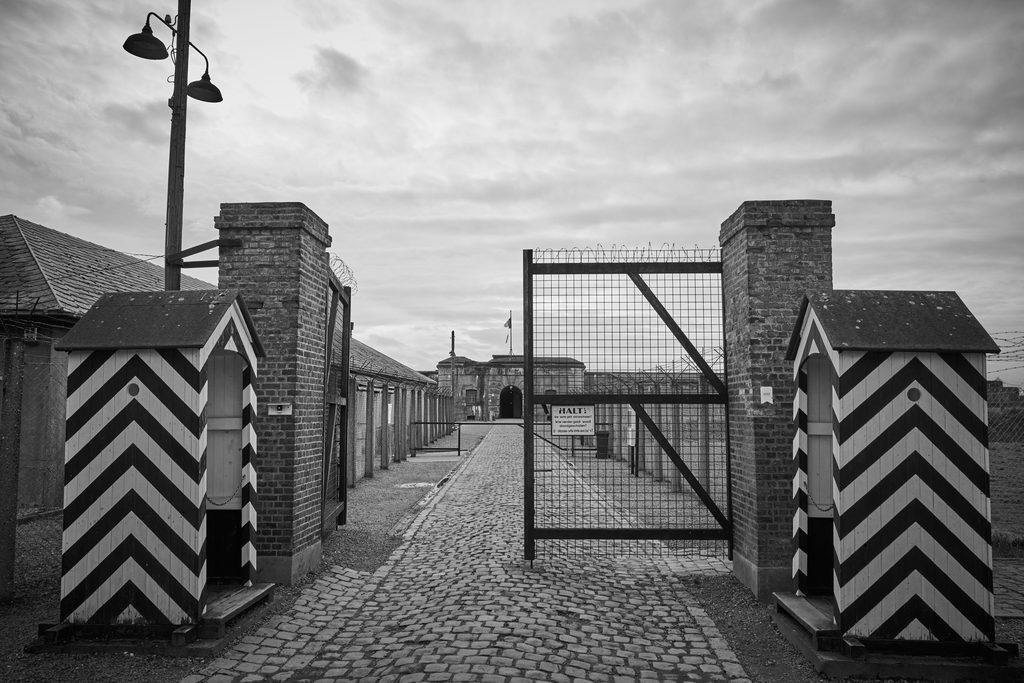 Allied troops arriving at the fort or the gates being opened. A symbol of relief and the end of the nightmare.