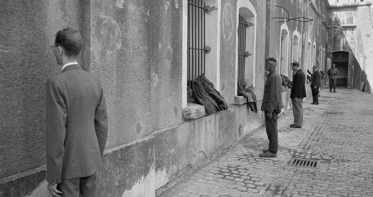 Exhibition of personal belongings or prisoner clothing. These small items are powerful reminders of the individuals behind the numbers, their lives interrupted by war.