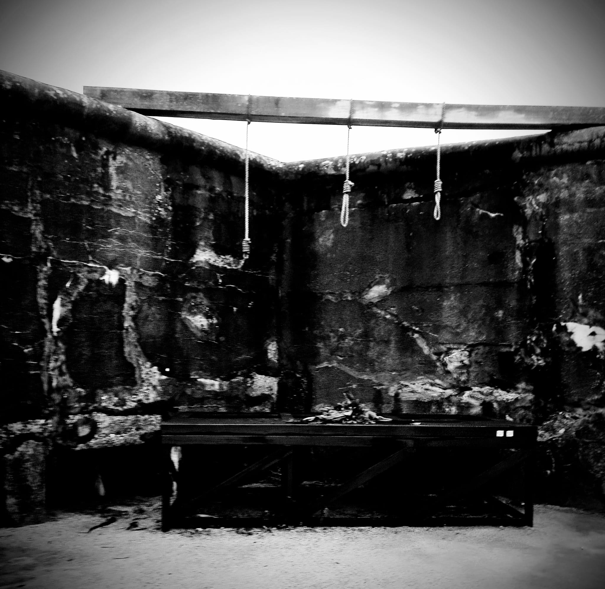 The execution grounds with the gallows and firing posts.