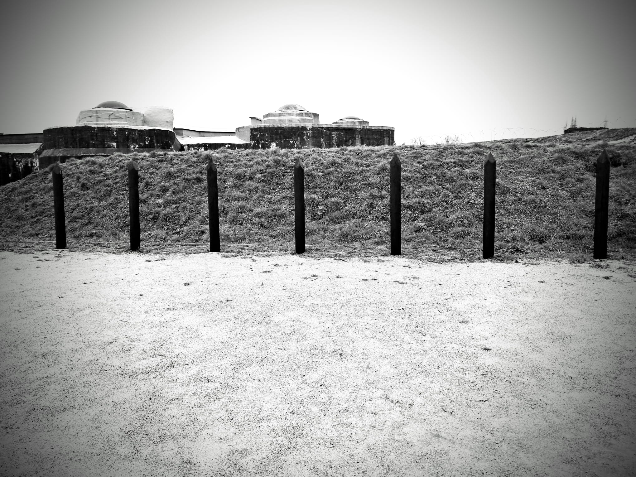 The execution ground where shootings took place. The silence here is heavy, marking the spot where many brave lives were brutally cut short.